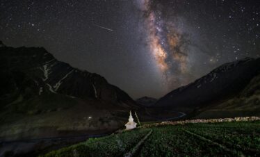 Milky Way galaxy over a scenic valley in Kaza, Himachal Pradesh, India at night.