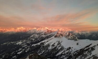 Breathtaking twilight view of snow-capped mountains in Sankari, India showcasing nature's beauty.