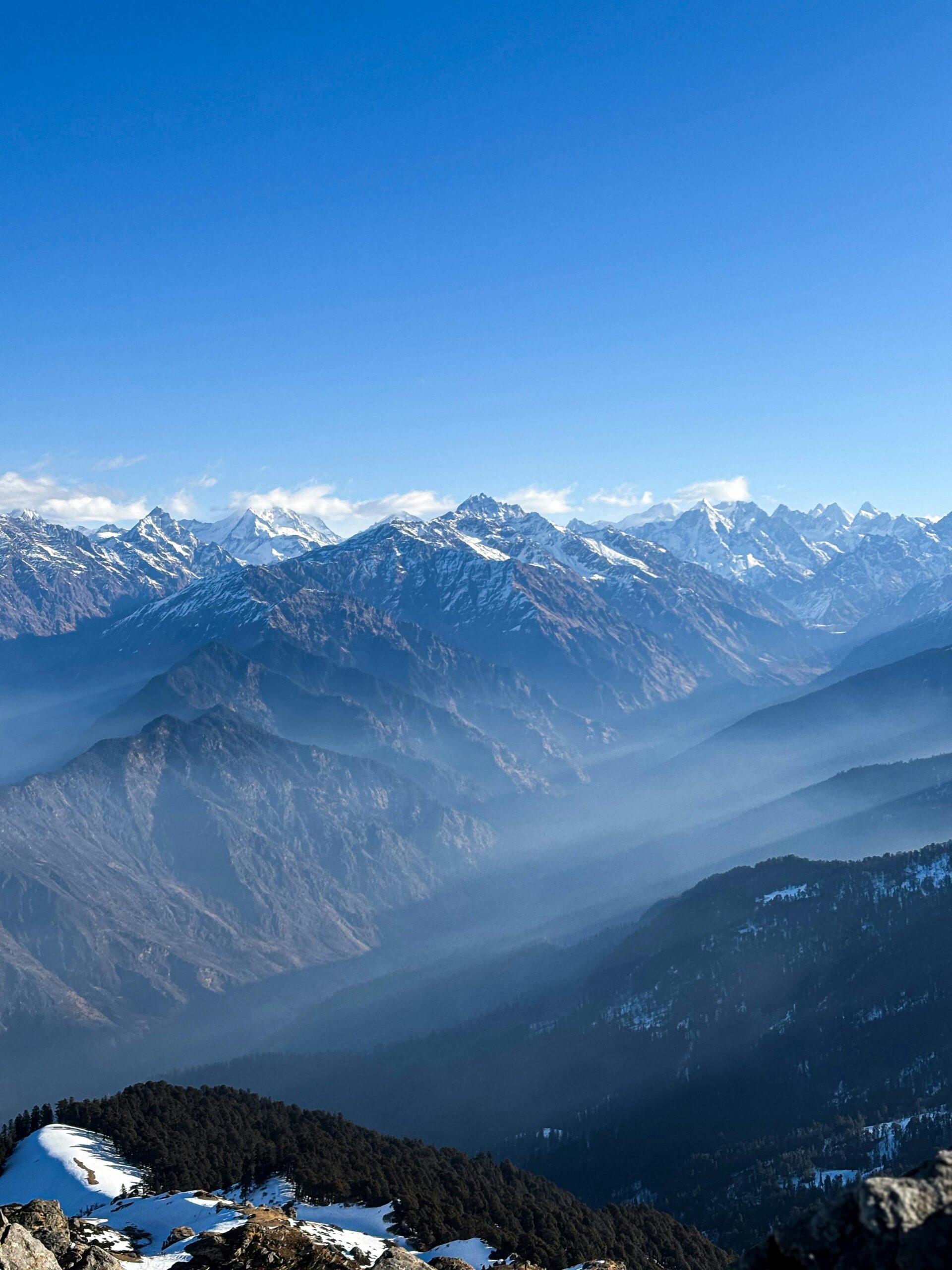 Stunning view of the Himalayan mountains in Uttarkashi, India on a clear day.