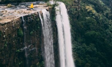 A majestic waterfall cascading down cliffs in Mpumalanga, South Africa. Tranquil natural scenery.
